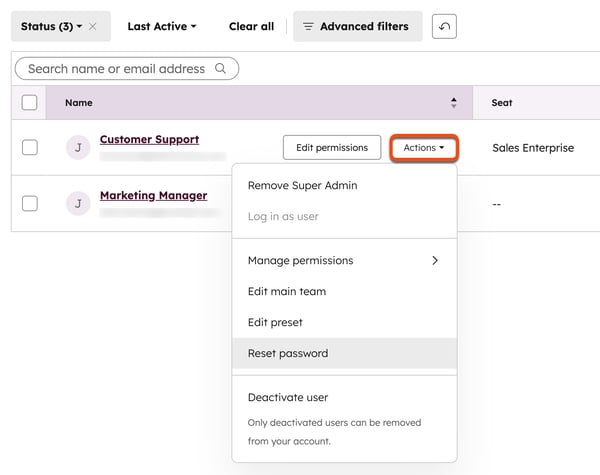 HubSpot user management table, displaying the Actions dropdown open and Reset password selected for a user.